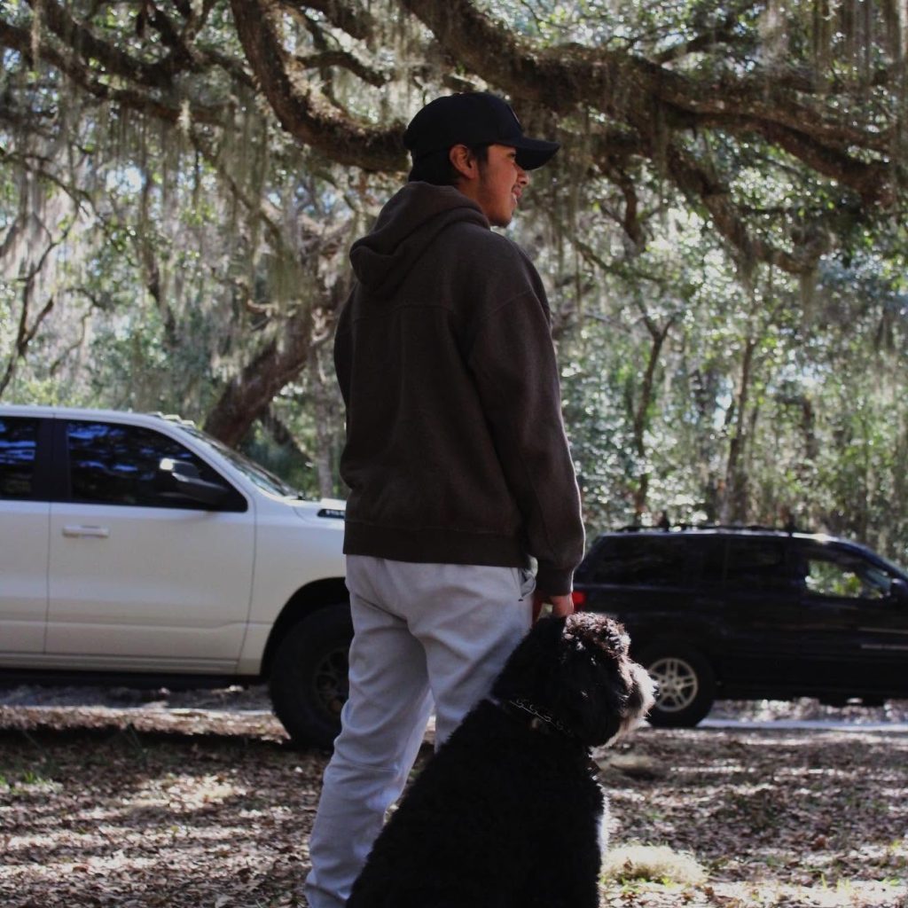 A1A Detailing owner Ethan Bly with the mobile detailing fleet at Amelia Island Plantation